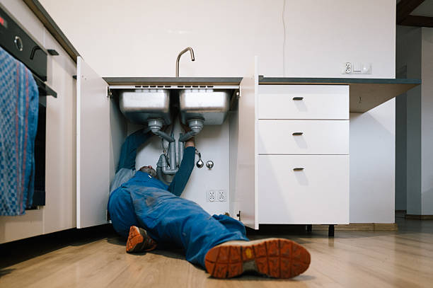 Professional Emergency Plumber technician working in Suffield, CT